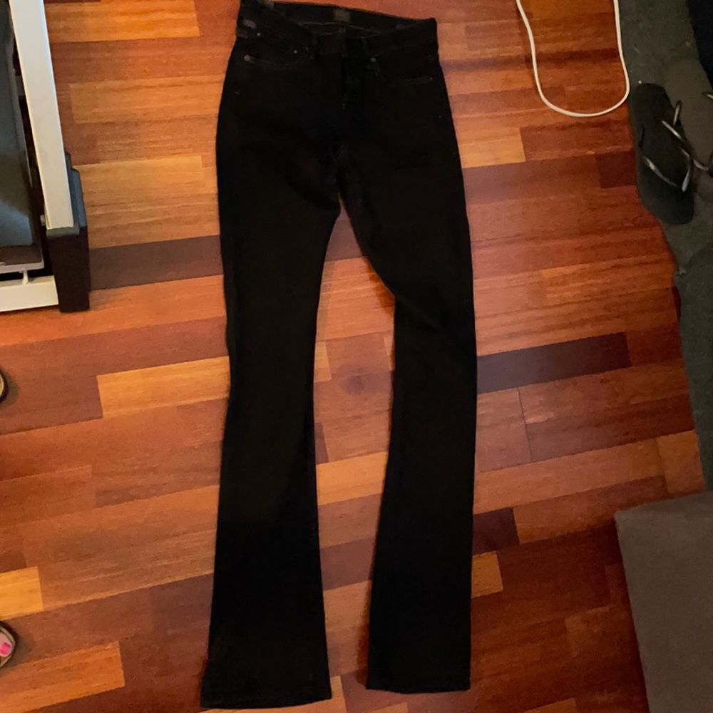 Black boot cut jeans by Citizens of Humanity.